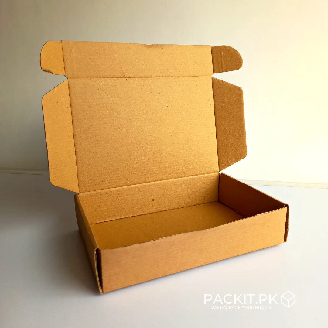 https://packit.pk/cdn/shop/products/kraft-ecommerce-packaging-boxes-packing-box-lahore-karachi-islamabad-buy-online-Pakistan_1445x.webp?v=1699965682